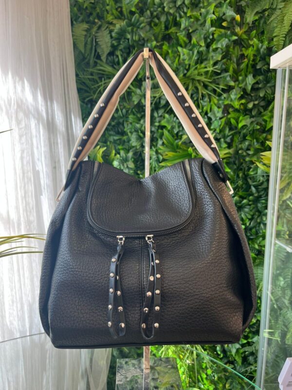 Bolso mochila tachuelas